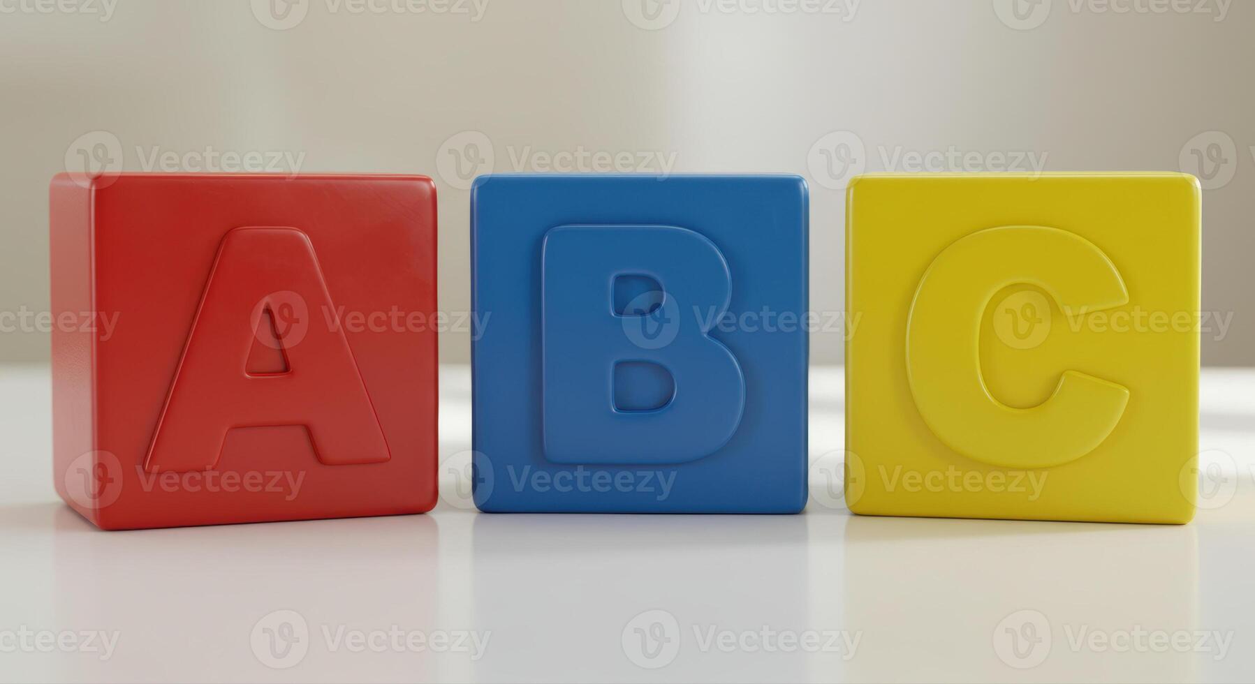 Brightly colored alphabet blocks displaying the letters a, b, and c arranged neatly. photo