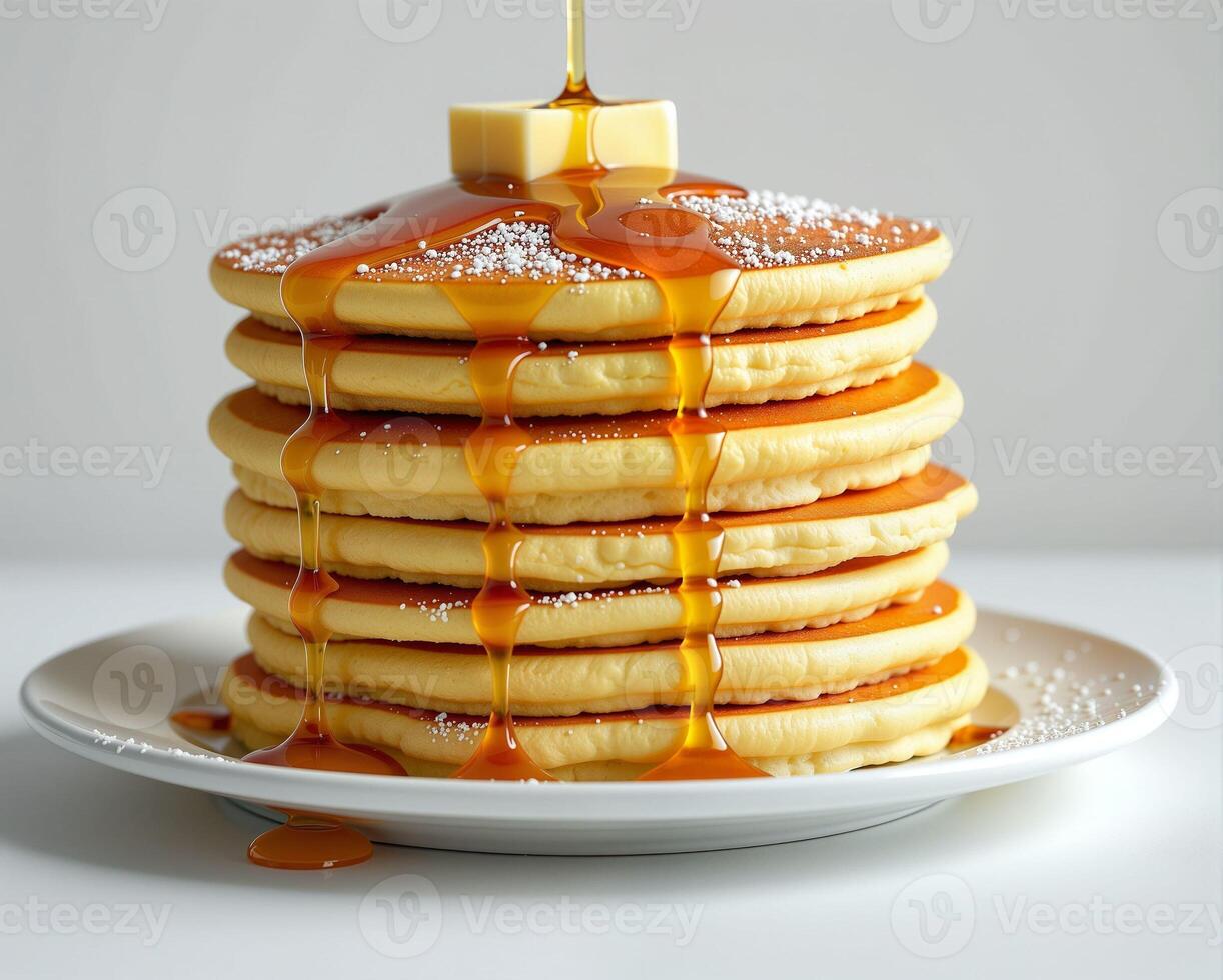 Fluffy Pancakes Stacked with Melting Butter and Delicious Syrup photo