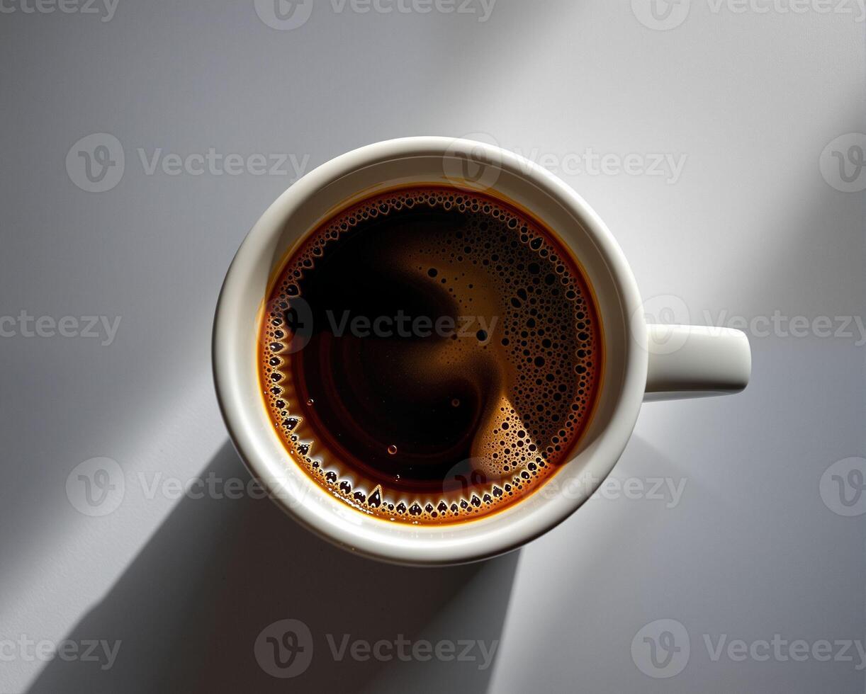 Close-Up of Freshly Brewed Dark Coffee in White Mug on Surface photo