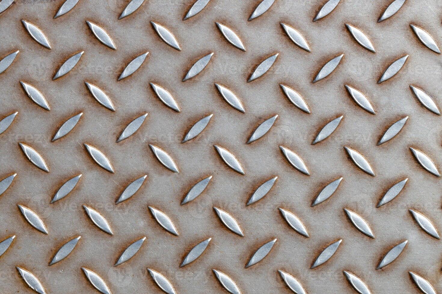 Industrial Metal Tread Plate with Raised Pattern photo