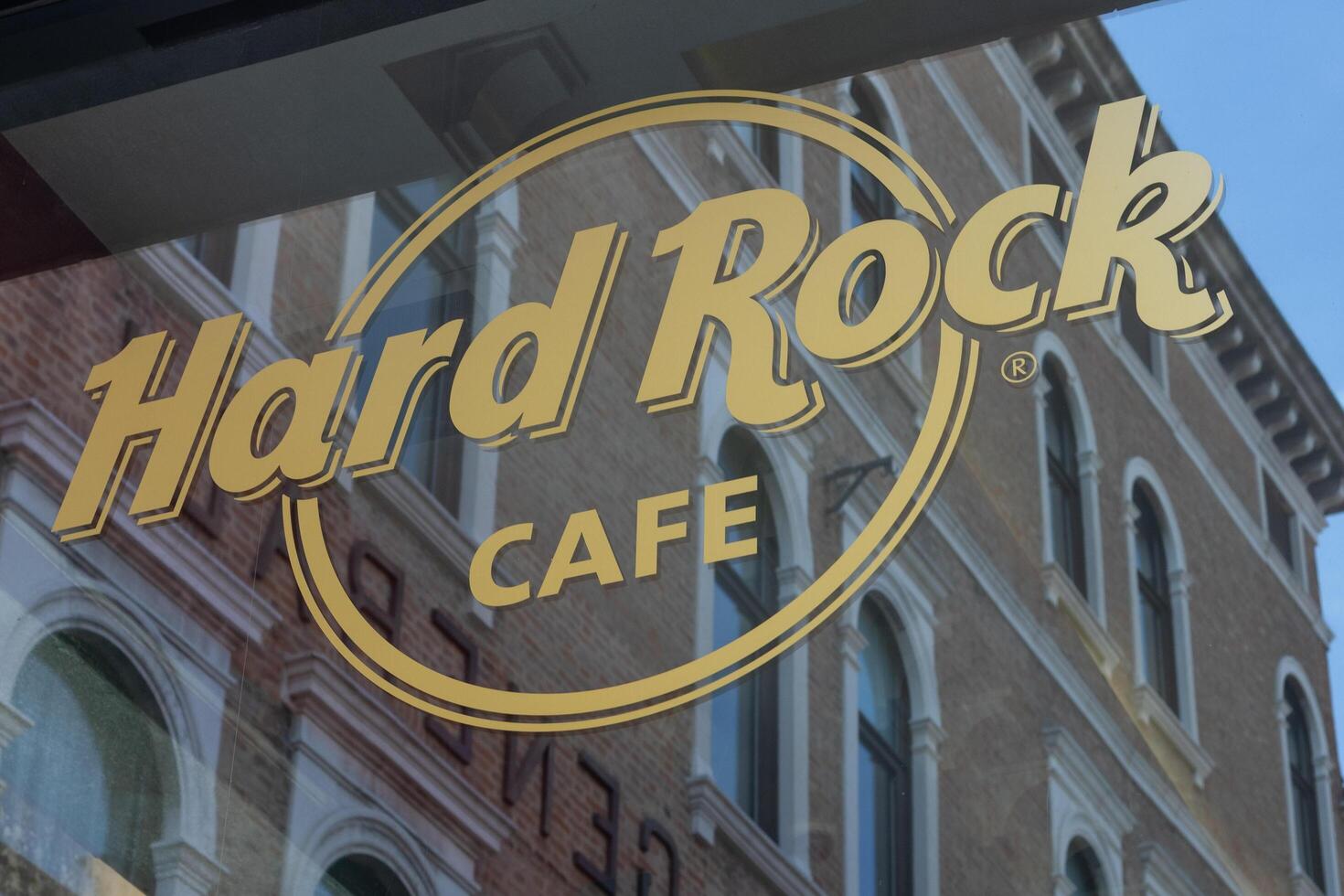 Venice, Italy - April 20 2025 Hard Rock Cafe logo on city window photo