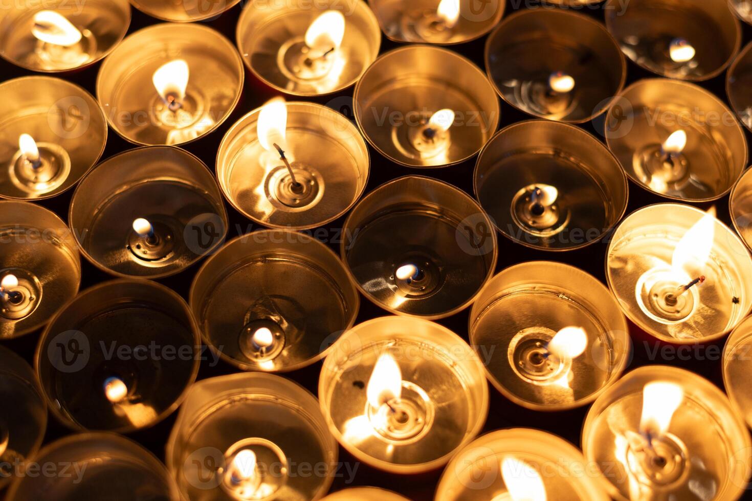 Many Small Candles with Bright Flames photo