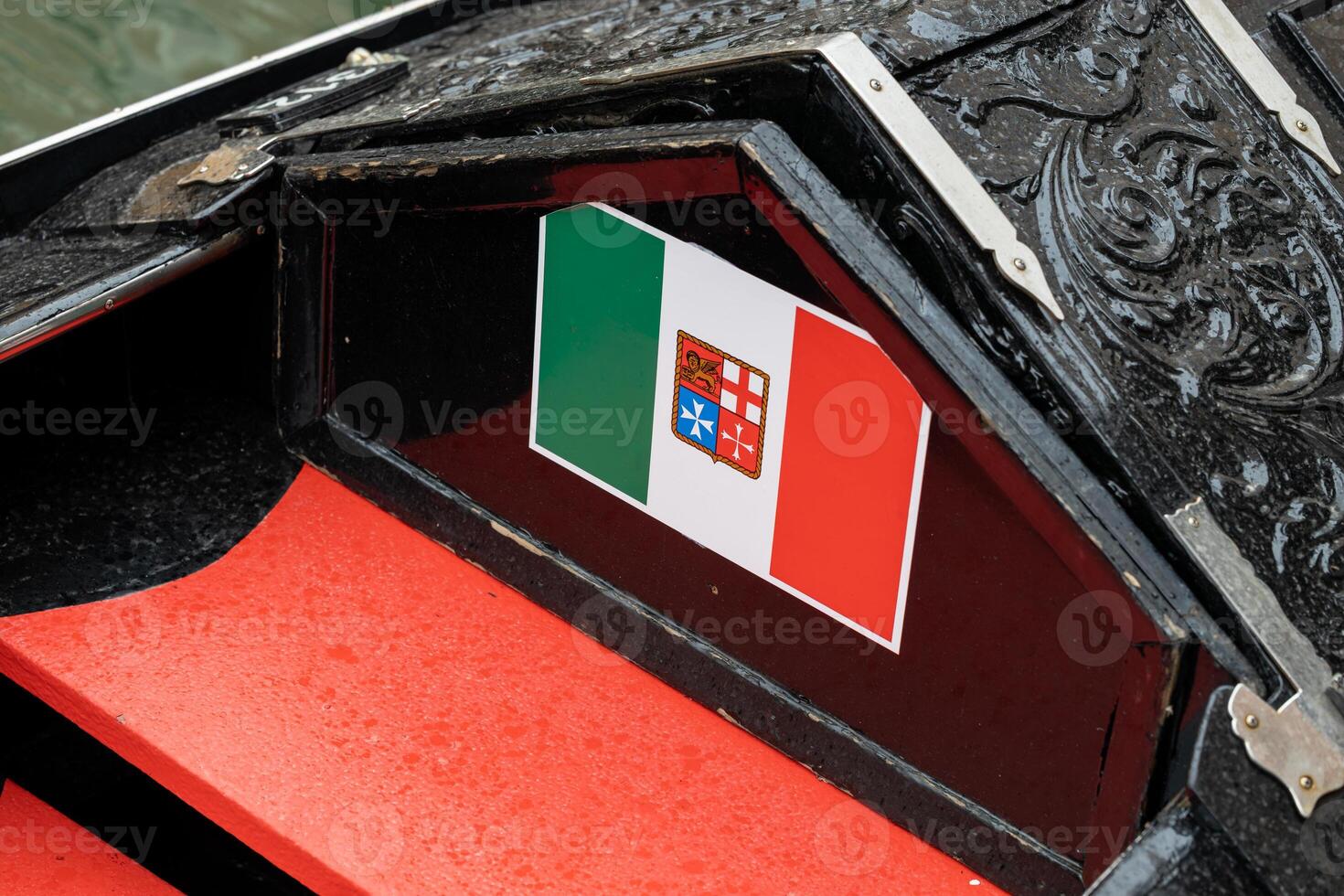 Italian Naval Flag on Traditional Boat photo