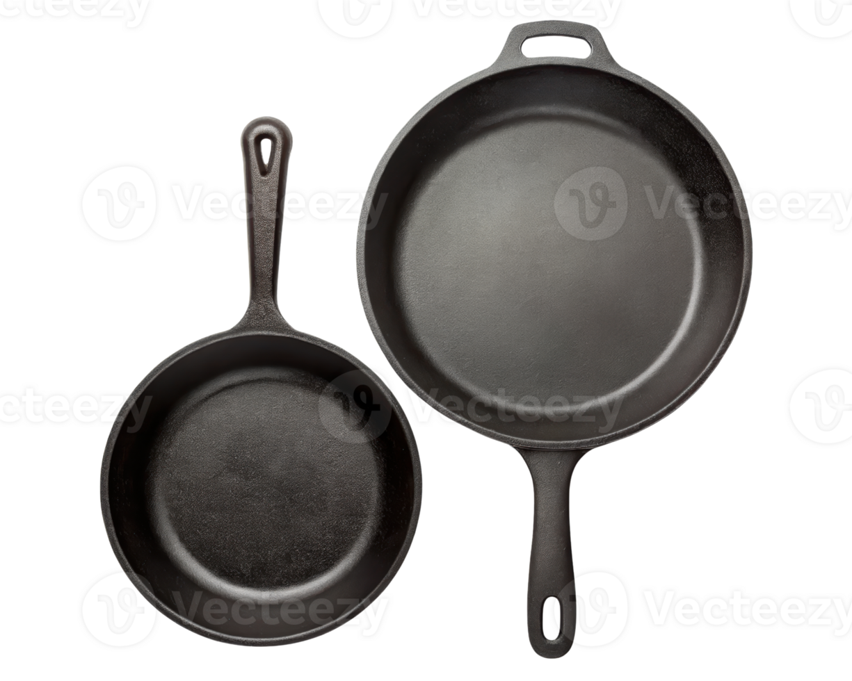 Two empty cast iron skillets on a transparent background png