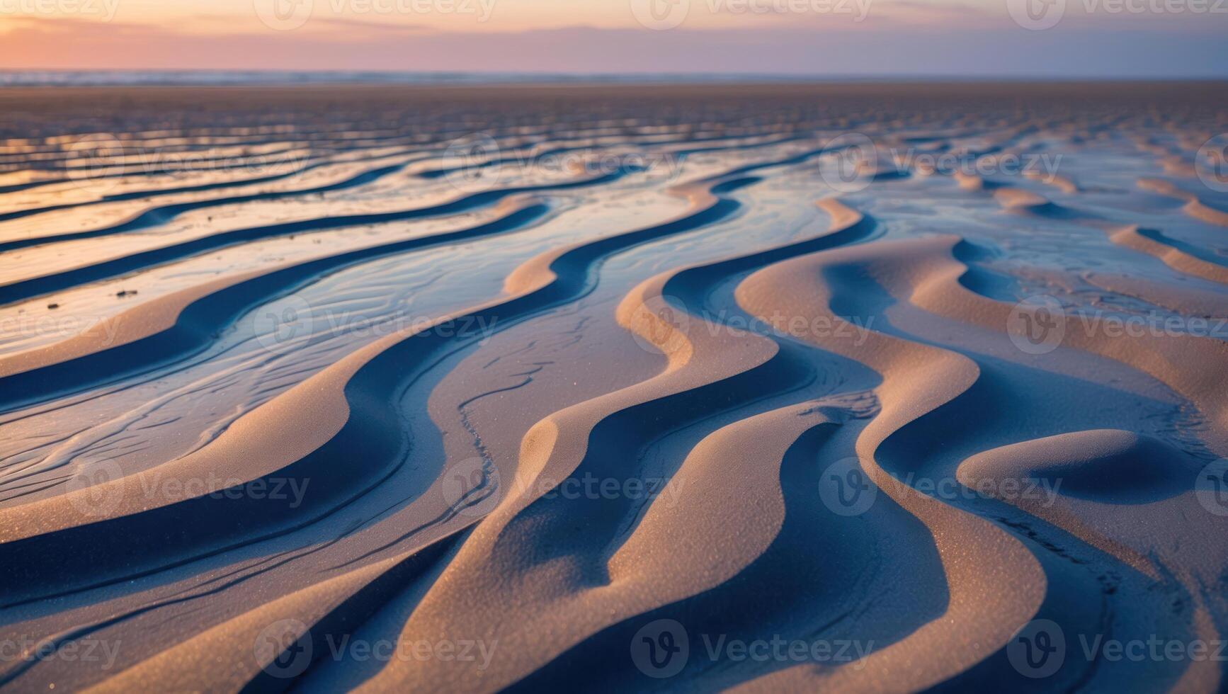 Sand Dune Patterns on Beach at Sunset with Horizon and Reflections photo