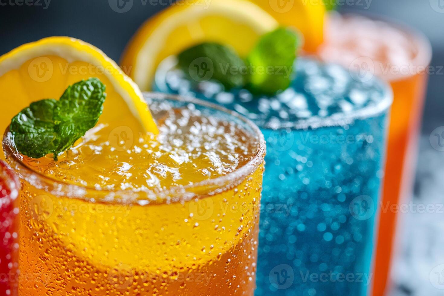 Colorful fizzy drinks with lemon and mint are refreshing during summer photo