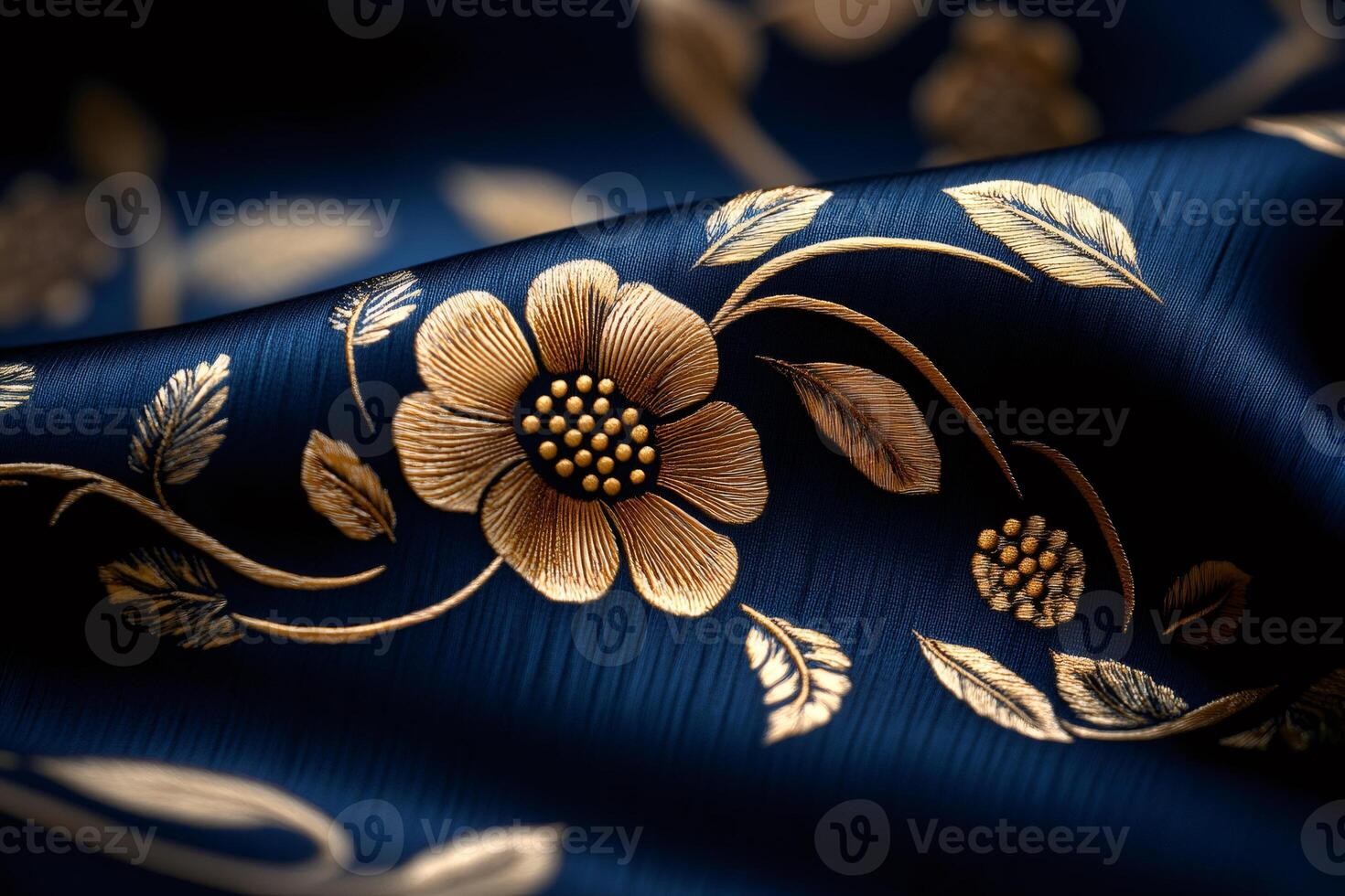 Luxurious dark blue silk fabric with gold floral embroidery photo