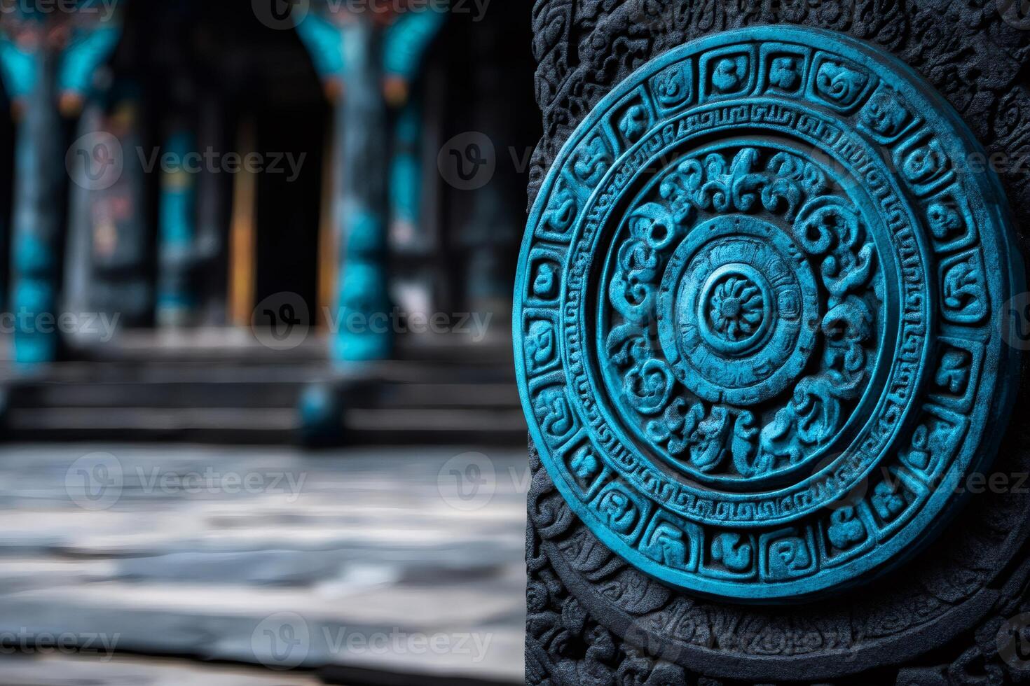Intricate blue carving adorns ancient temple pillar photo