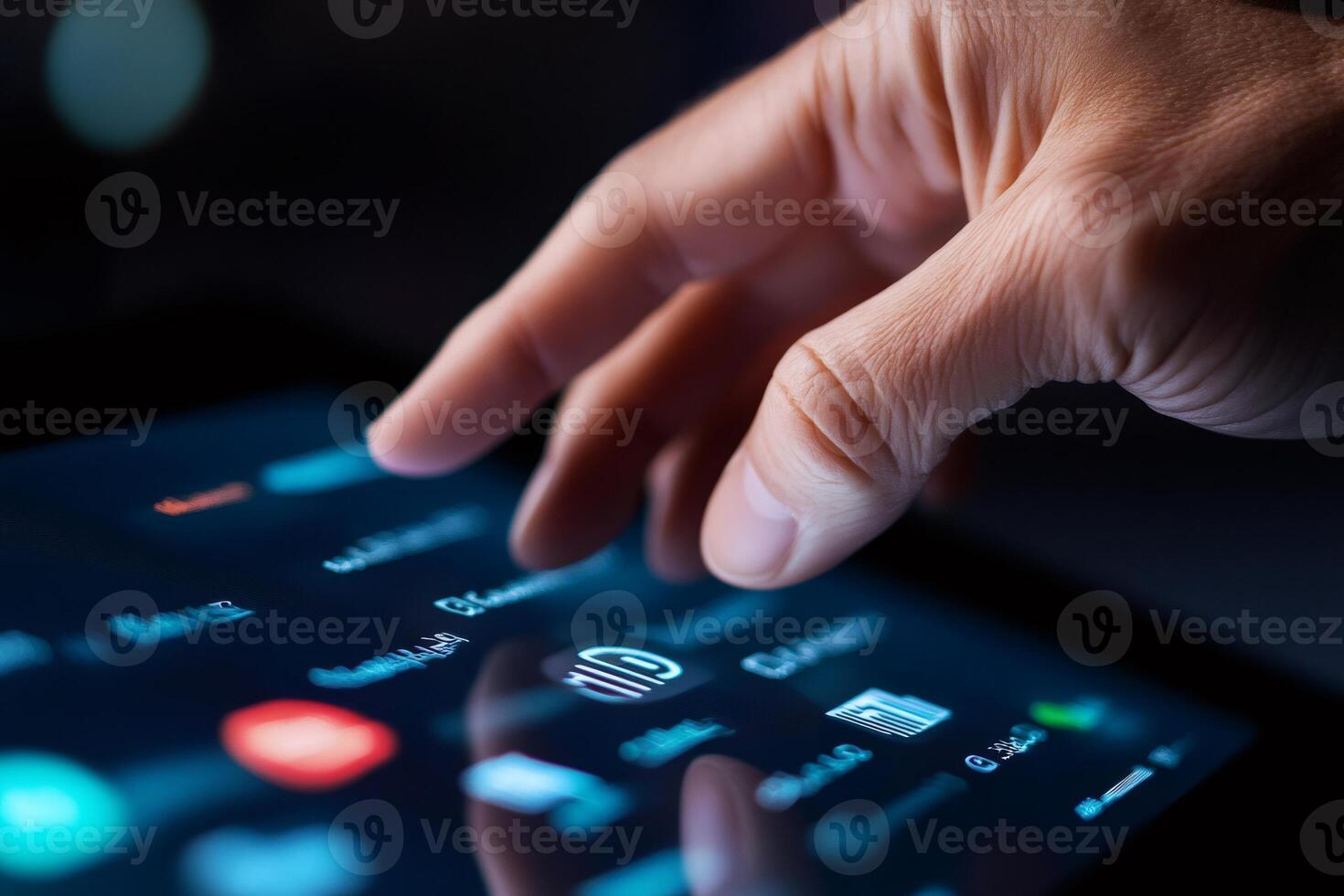 Businessman using futuristic digital tablet with holographic interface in the dark photo
