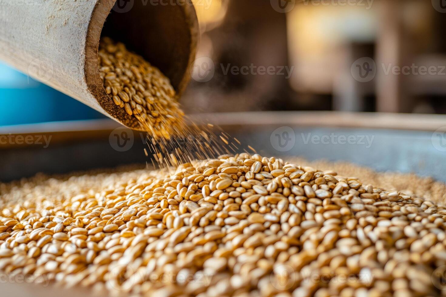 Golden wheat grains pouring into container, food production and agriculture industry photo