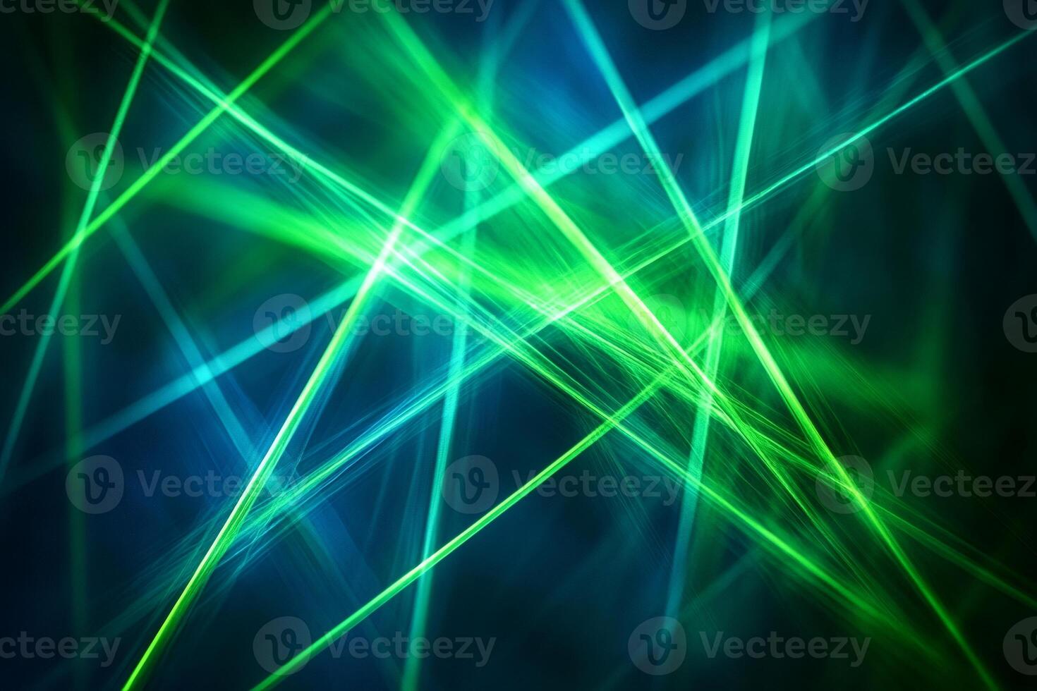 Green and blue laser beams creating a dynamic abstract light pattern photo