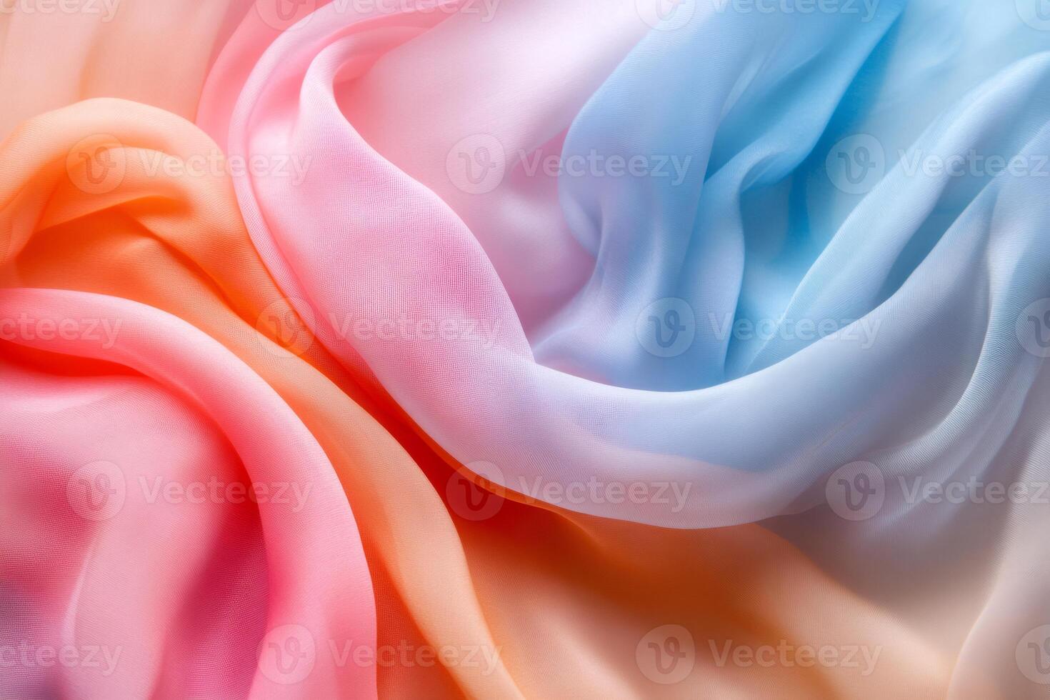 Pastel colored chiffon fabric forming elegant waves, flowing textile background photo