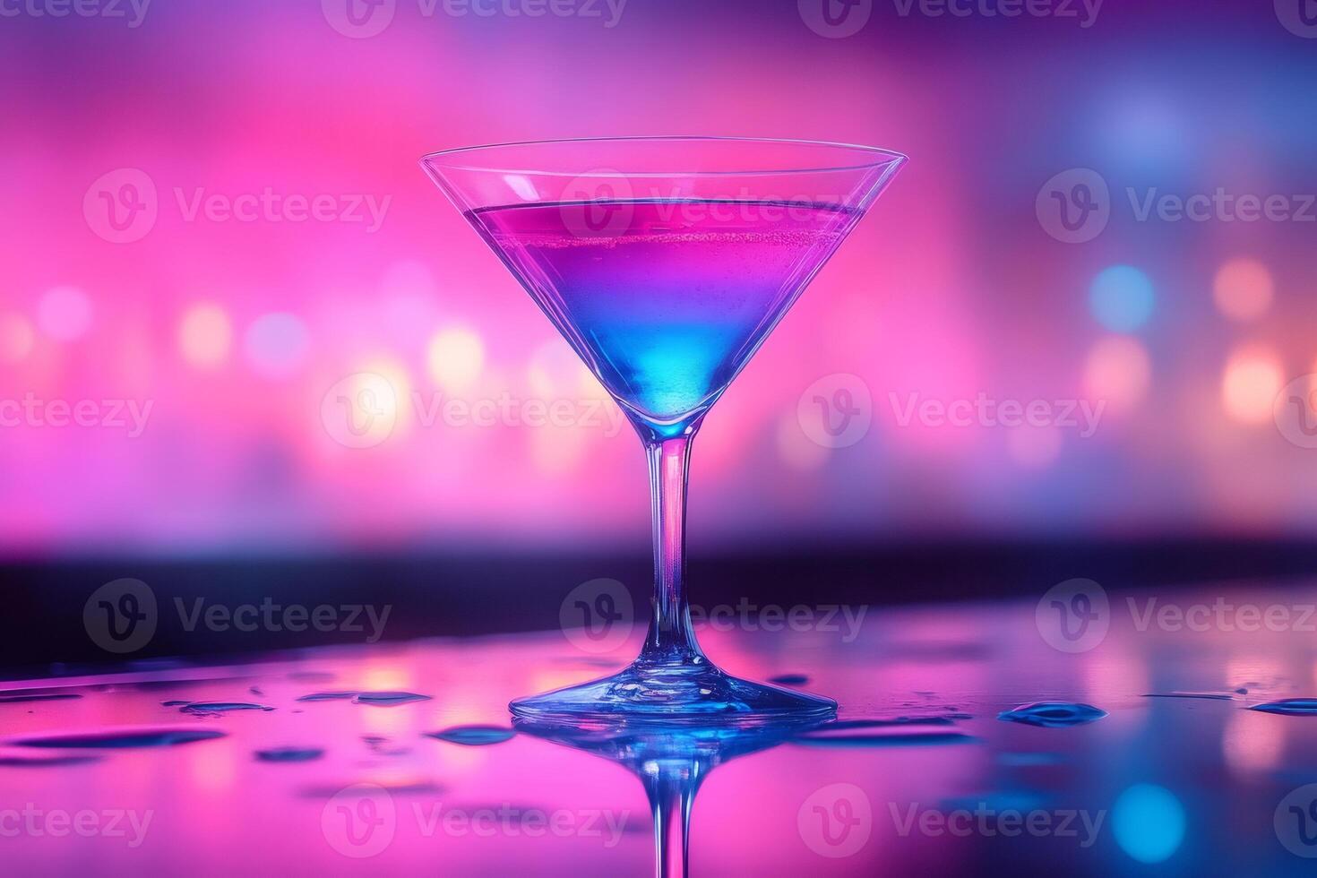 Colorful cocktail glass shining on bar counter with neon lights in the background photo