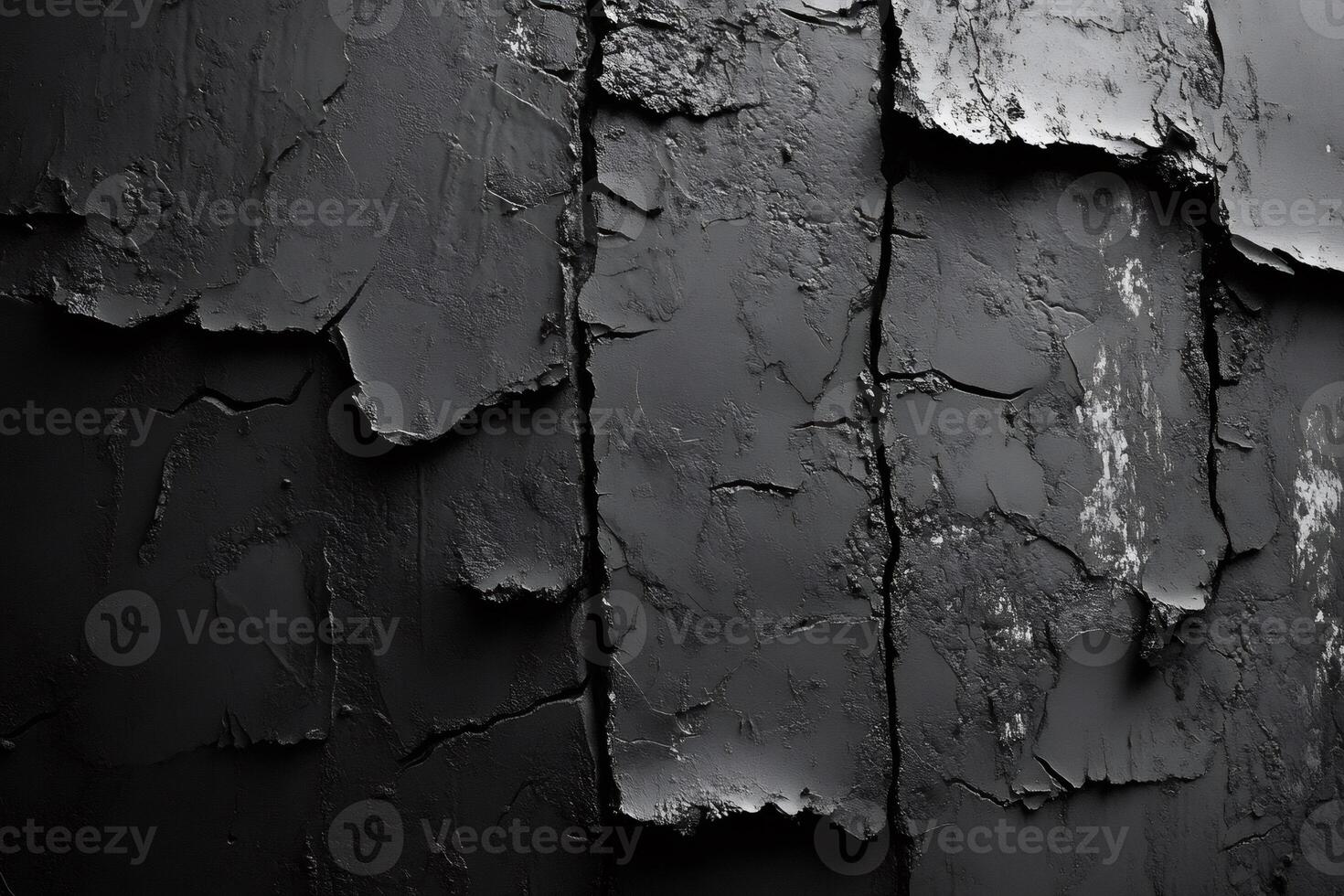 Dark and cracked surface creating dramatic textured background photo