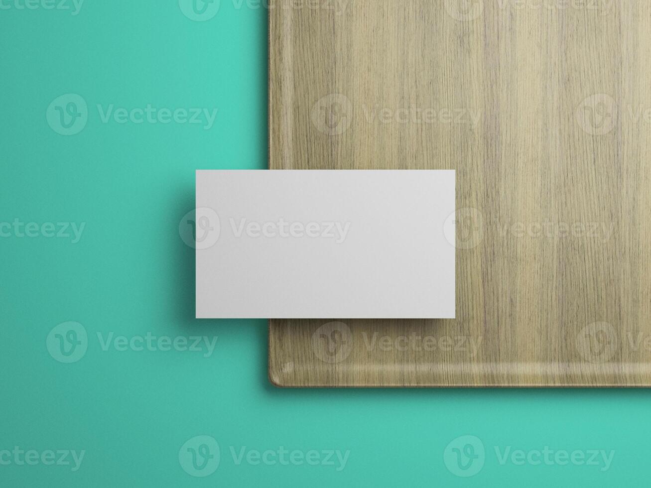 Minimalist business card mockup on wood tray and teal background, perfect for branding presentations. photo