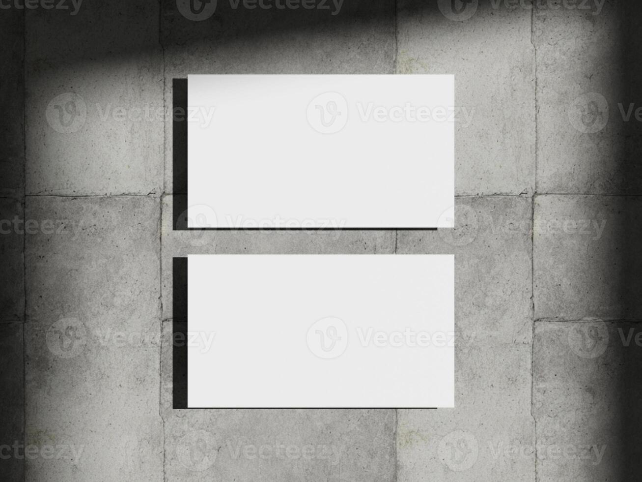 Modern business card design mockup featuring two stacked cards with clean, minimalist style on a concrete floor. photo
