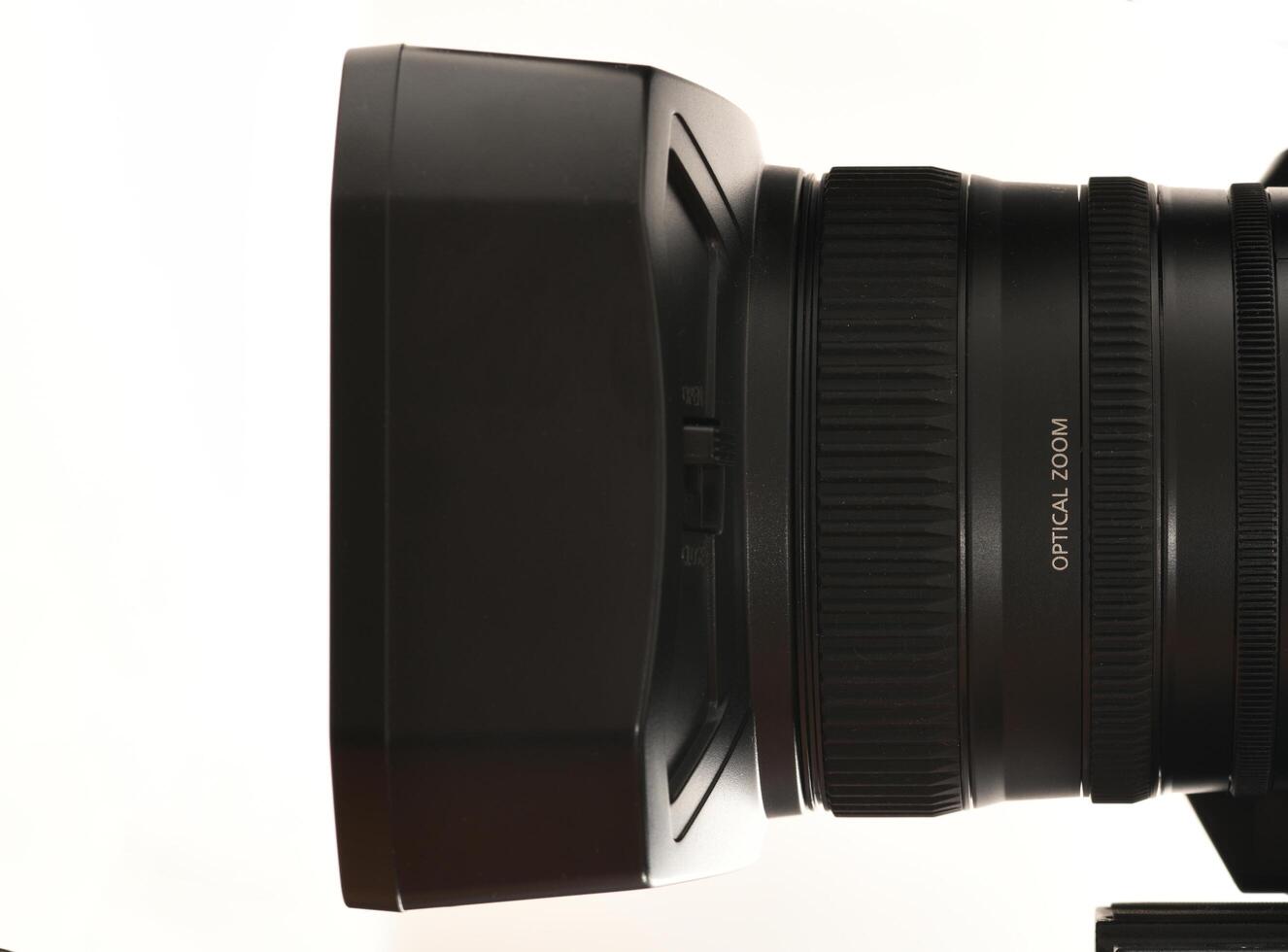 Extreme macro photography of camcorder camera lens - side view photo