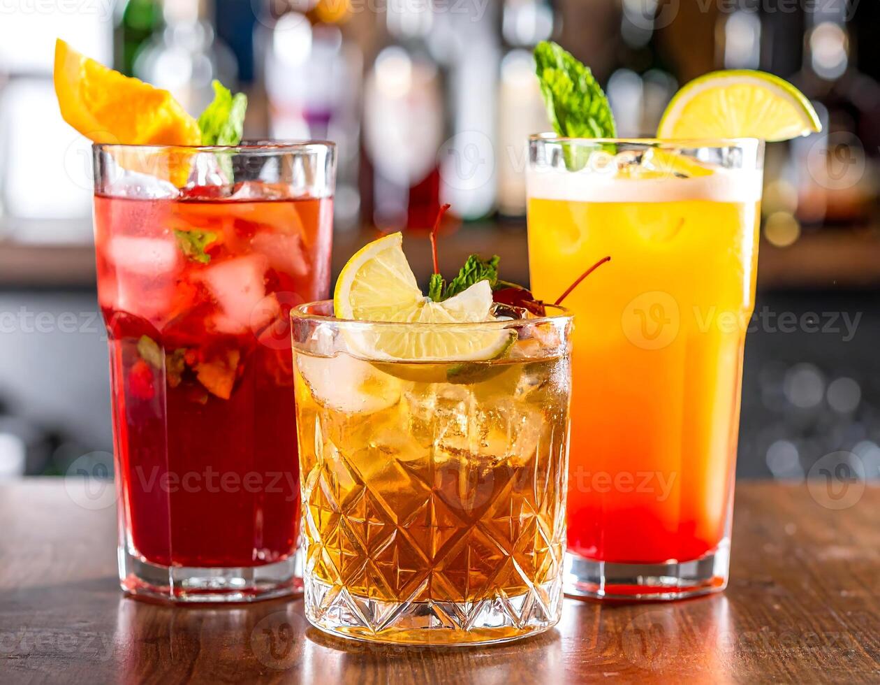 Bartender preparing cocktails with orange, lemon and lime at the bar photo
