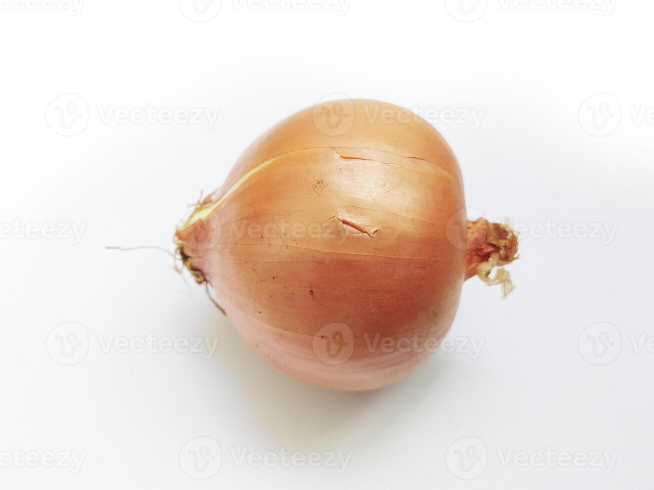 Single, ripe onion on a white background. Perfect for culinary, health, or minimalist designs. Simple, clean aesthetic conveys freshness and natural goodness. photo