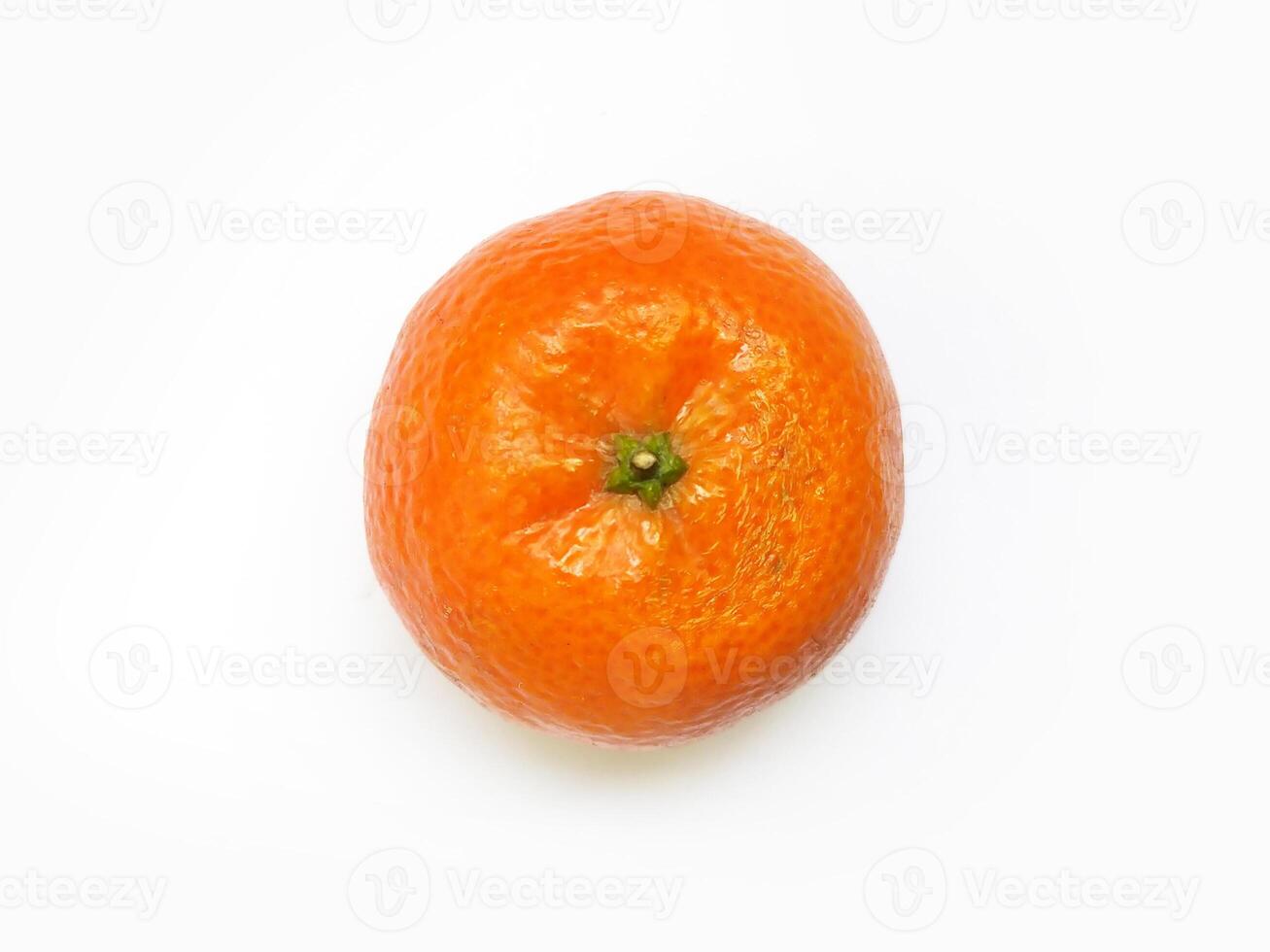A vibrant, single mandarin orange sits centrally against a stark white background. Its textured peel and juicy appearance suggest freshness and health. photo