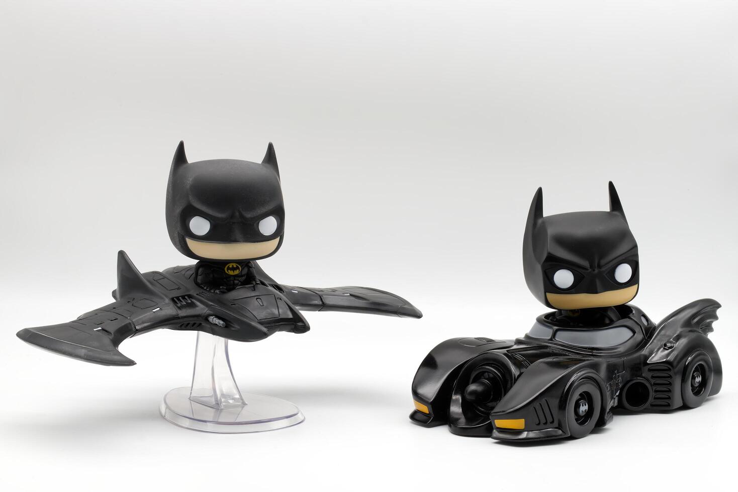 Bologna Italy April 8, 2025 Batman in Batmobile and Batwing