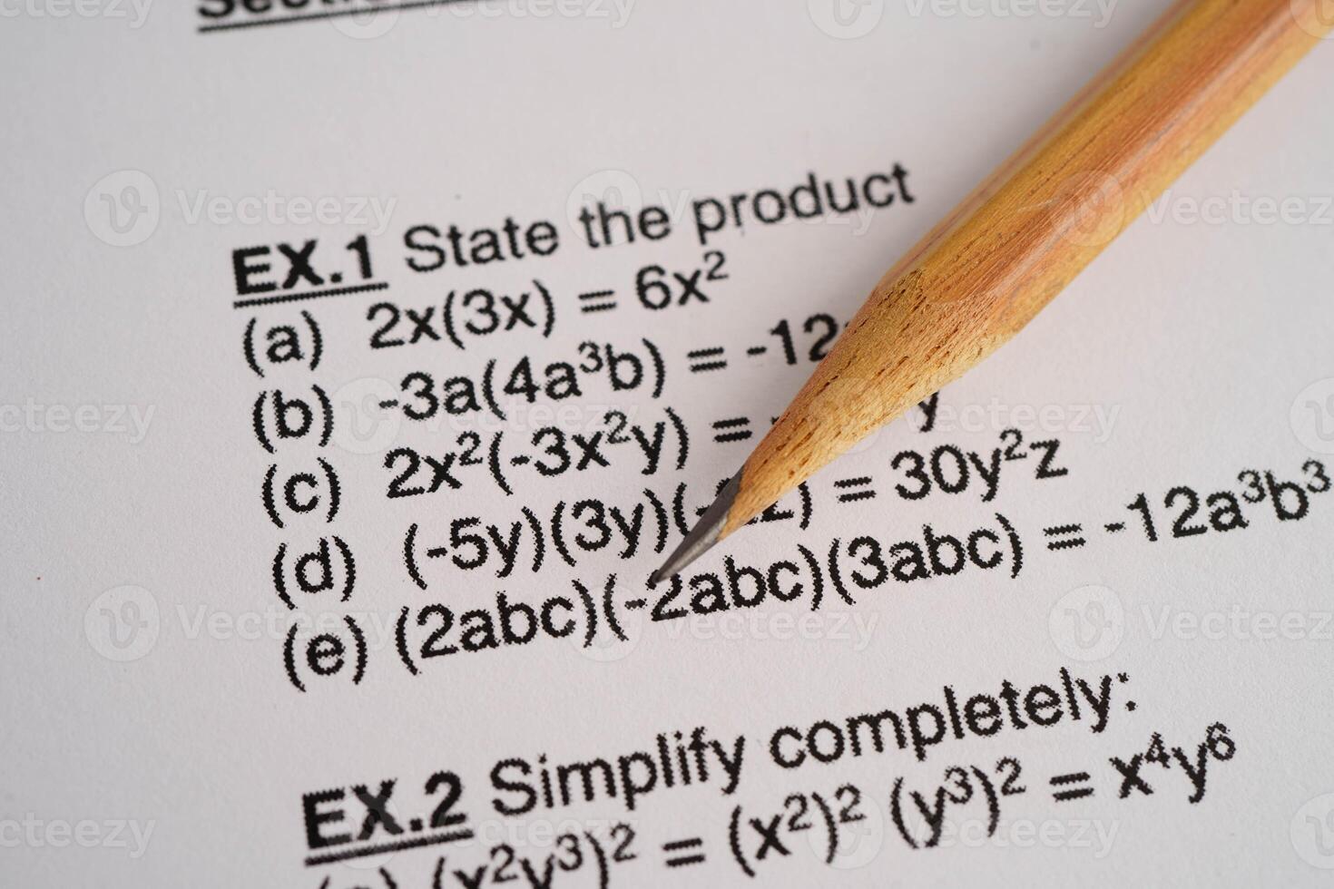 Pencil on mathematic formula exercise test paper in education sch photo