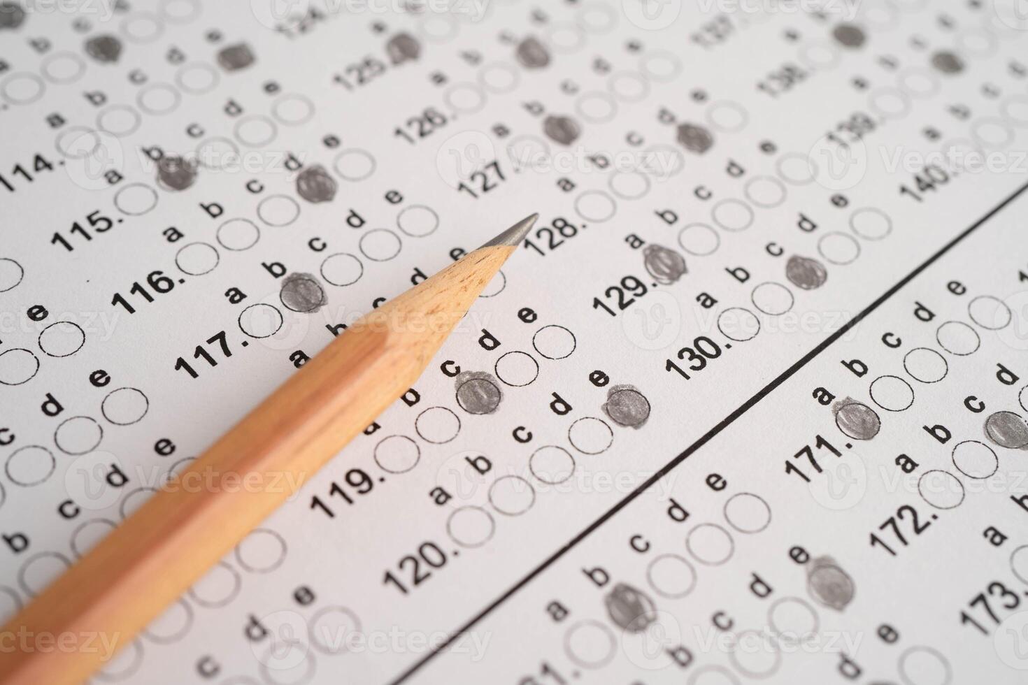 Answer sheets with pencil drawing fill to select choice, educa photo