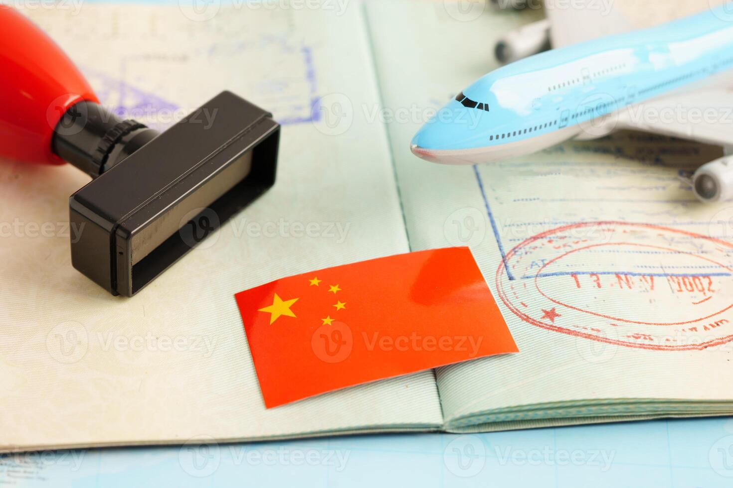 China passport with approved stamp on document for tourism. photo