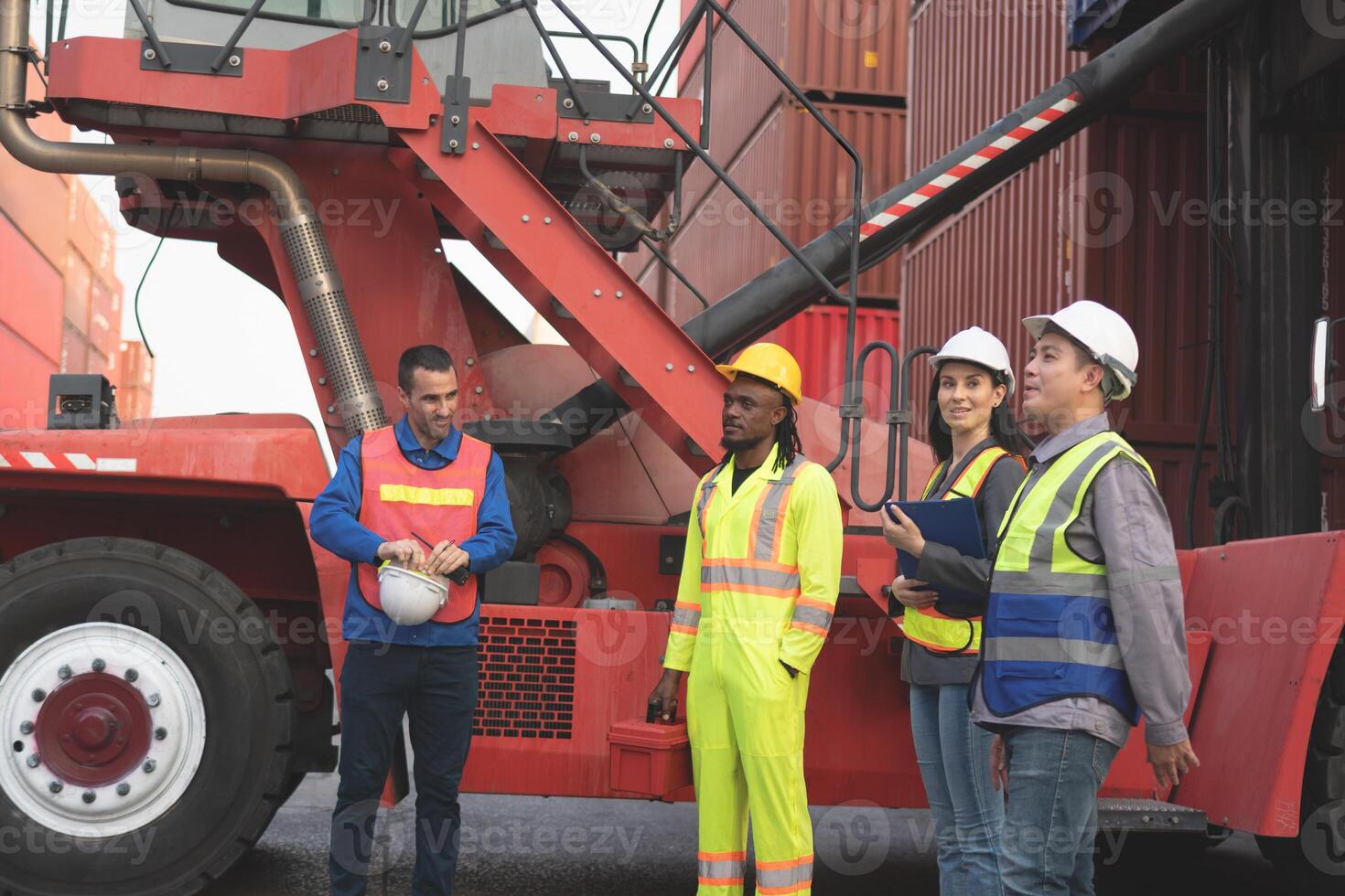 Group of engineer and foreman worker team in industry containers yard, Success teamwork and unity concepts photo