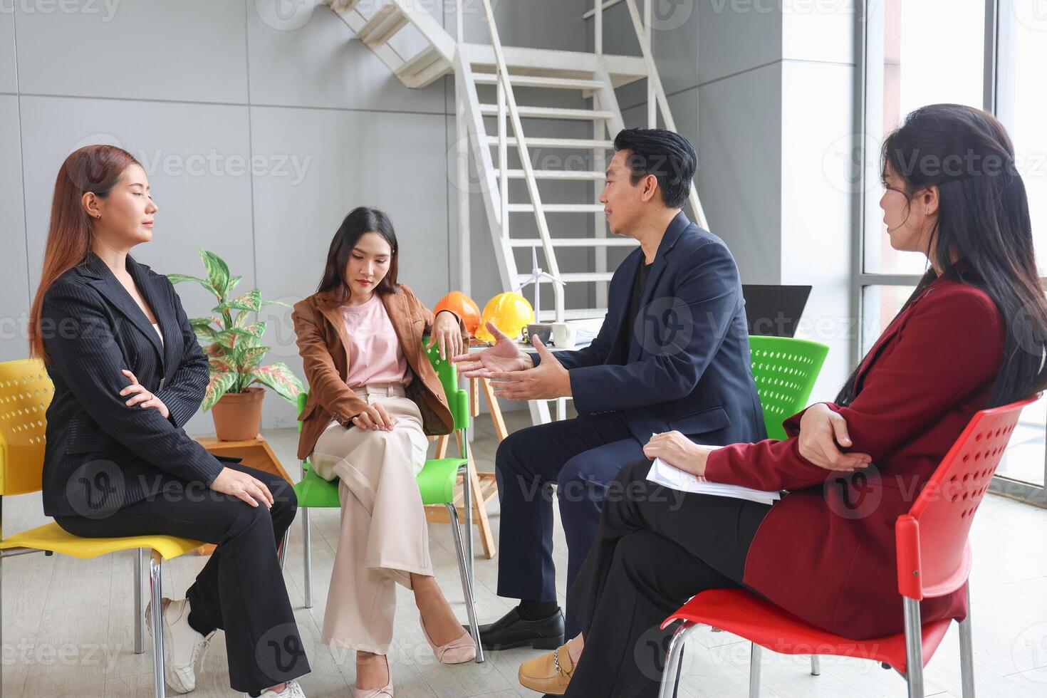 Asian businesspeople team discussing ideas in modern office, Teamwork and brainstorming concepts with businesspeople in office meeting photo