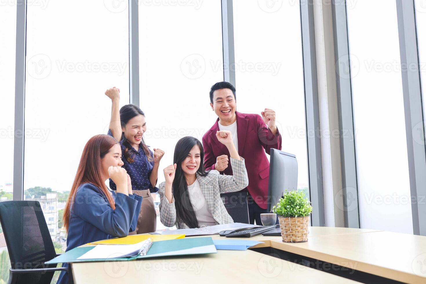 Cheerful Business Team Celebrating Success in Modern Office, Team Meeting and Brainstorming Concepts photo