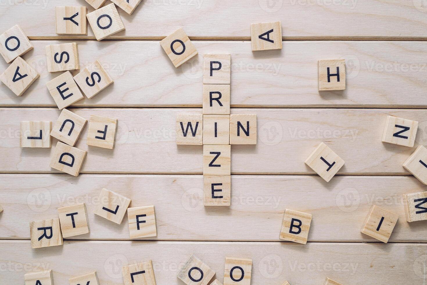 A wooden cross with the letters WIN PRIZE written in the middle photo