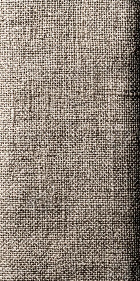 Fabric background with textured weave in natural tones photo