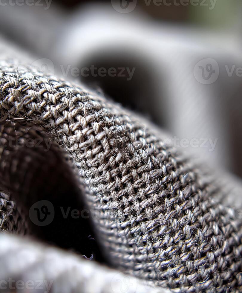 Close-up of textured gray fabric with intricate weaving photo