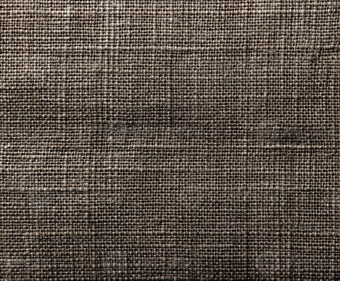 Textured fabric background in neutral tones for design projects photo