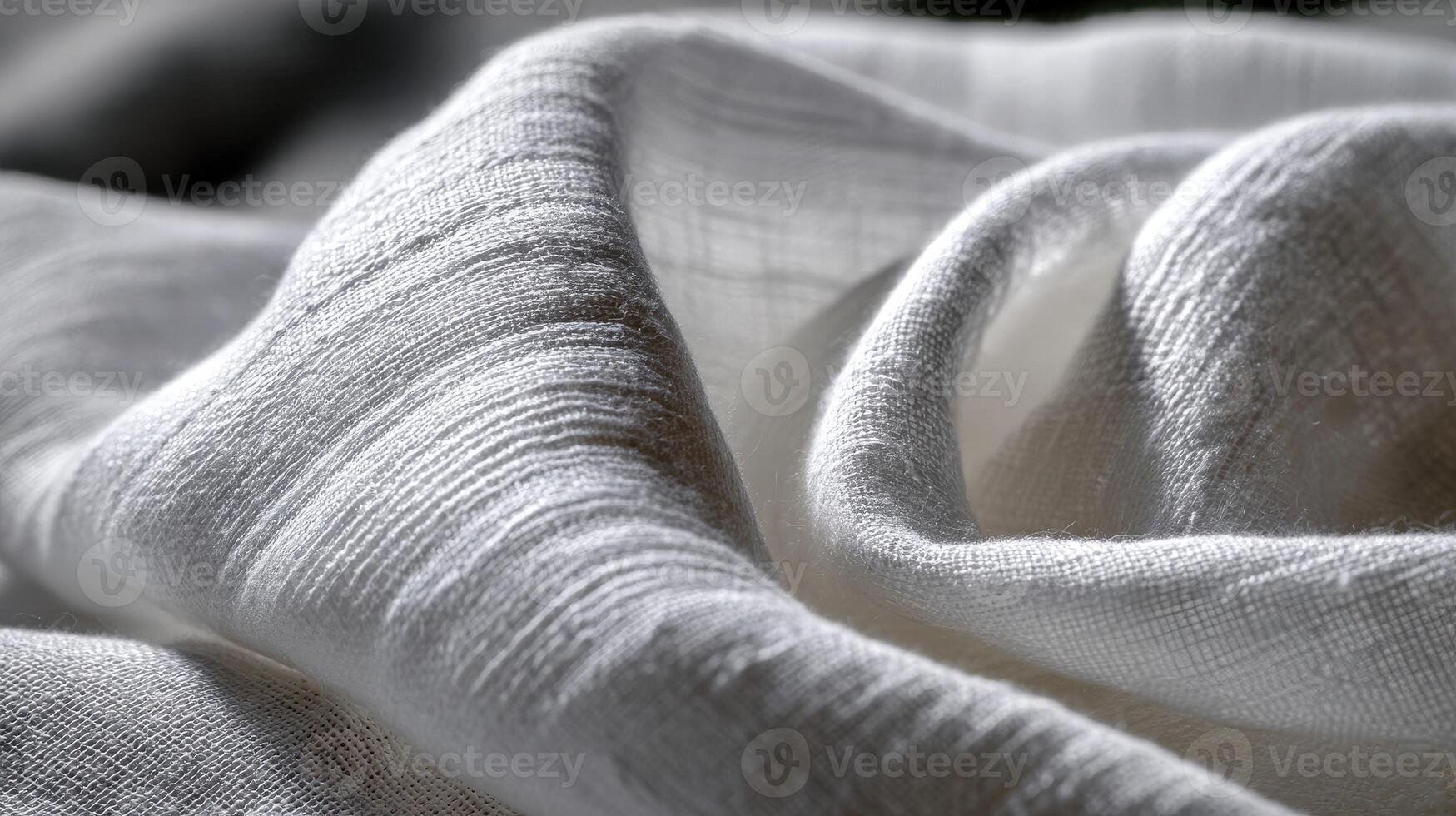 Soft white fabric draping creates an elegant textured backdrop photo