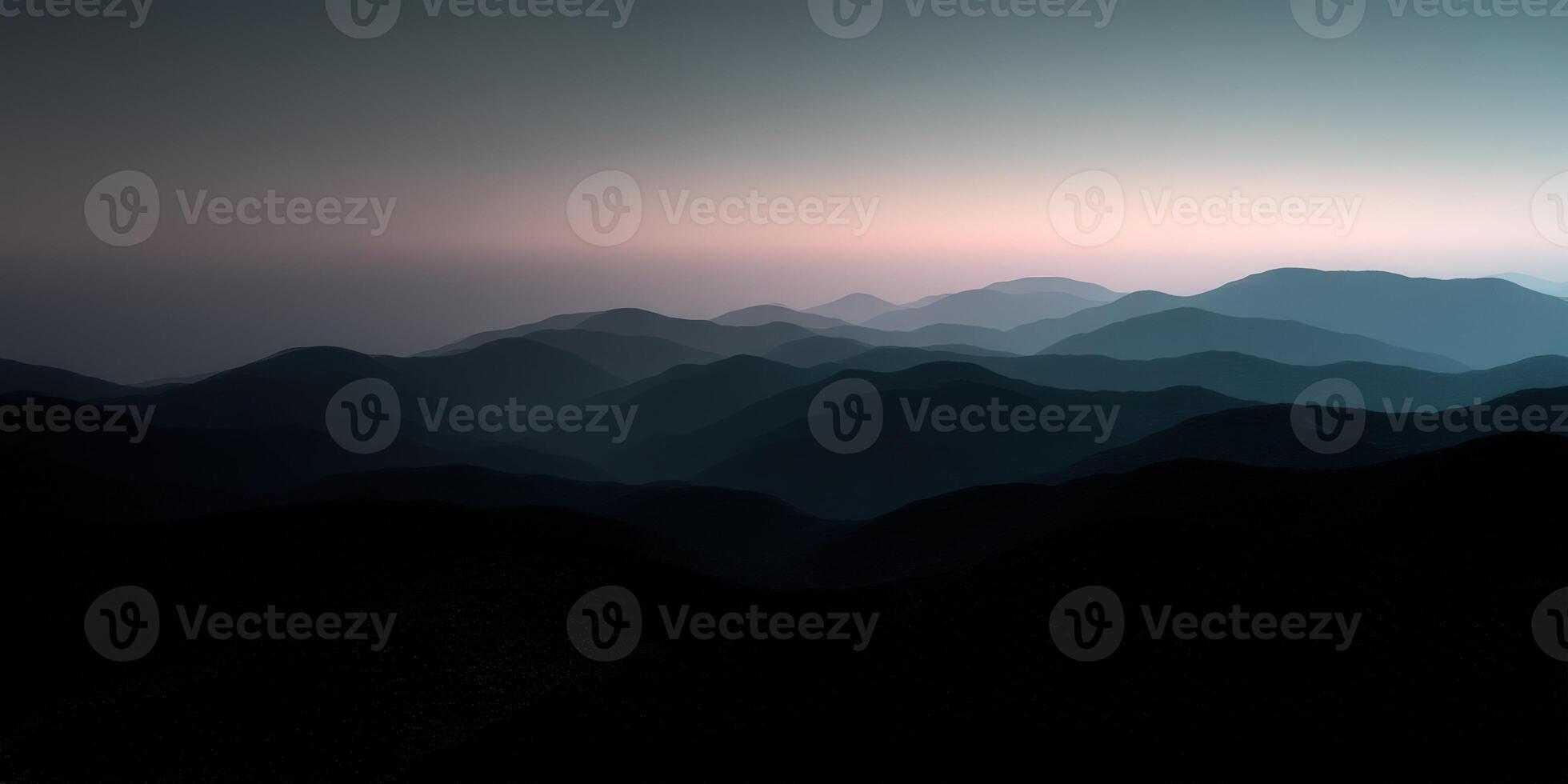 Mountains transition from day to twilight photo