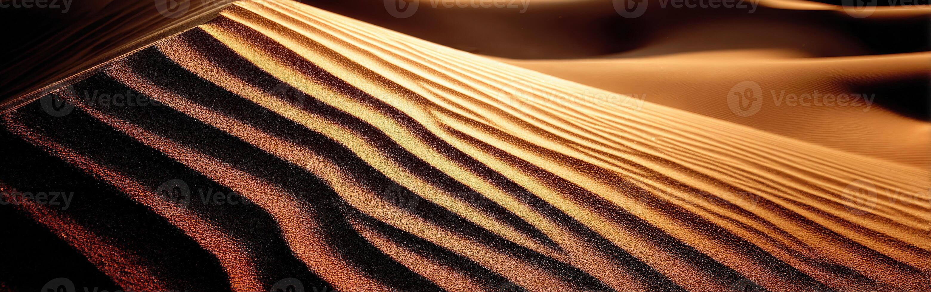 Sand waves create patterns in golden desert landscape photo