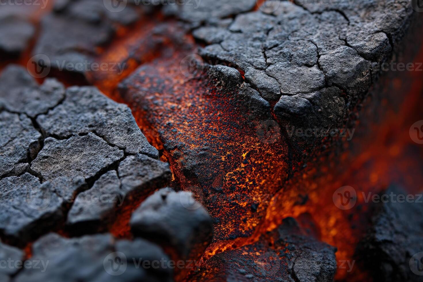 A close up of a lava flow with red and black photo