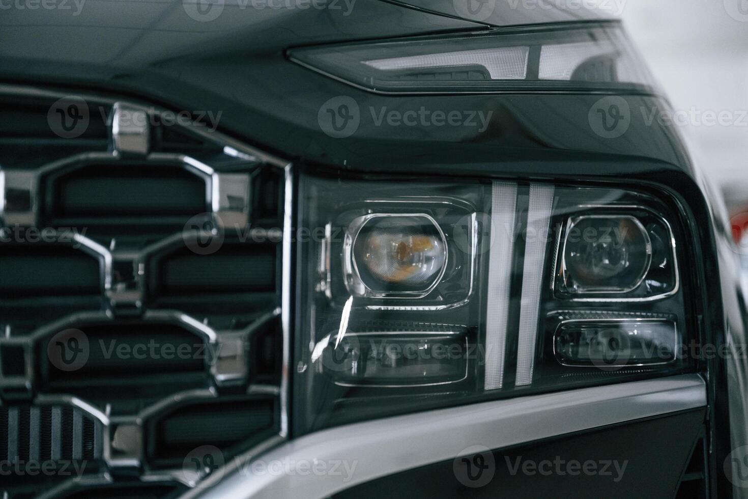 Front close up view of,, modern black car photo