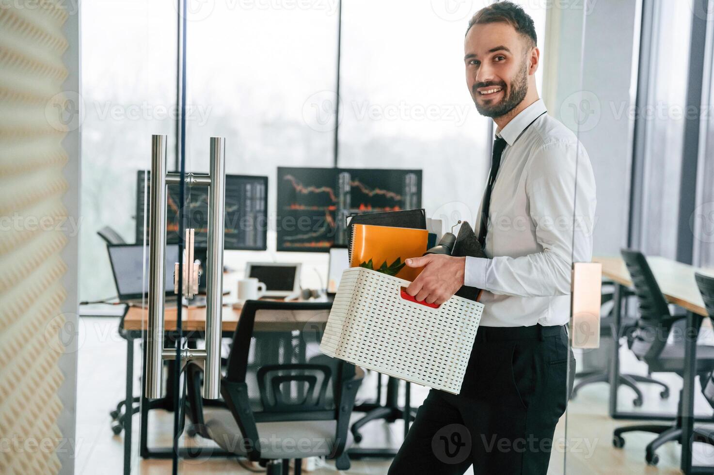 Unemployed, man, is, with personal belongings after being fired photo