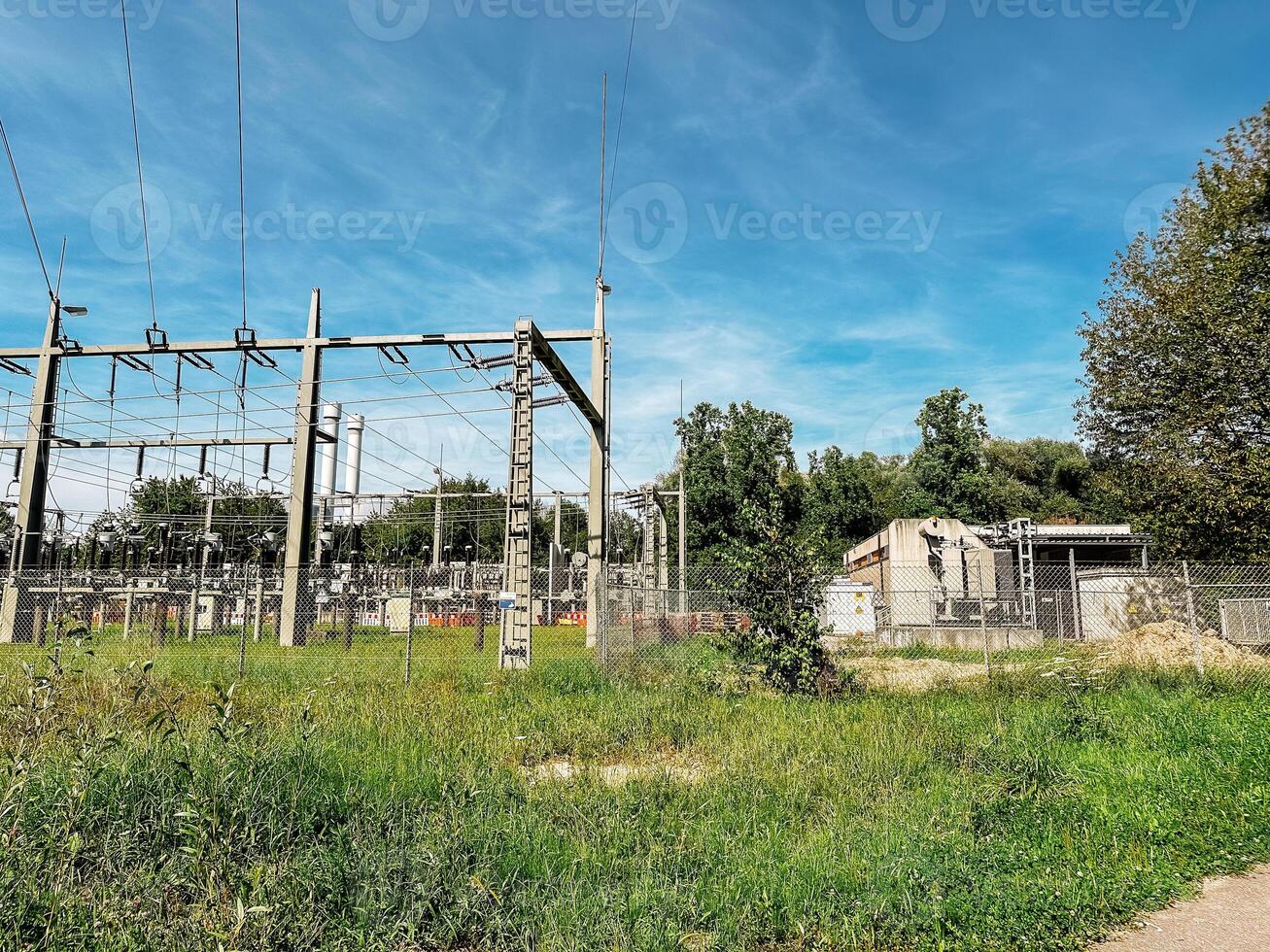 Large power station with a fence around it photo