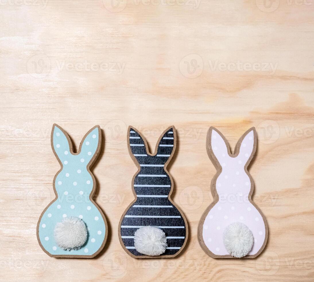 The rabbits are of different colors, with one being blue, one being black photo