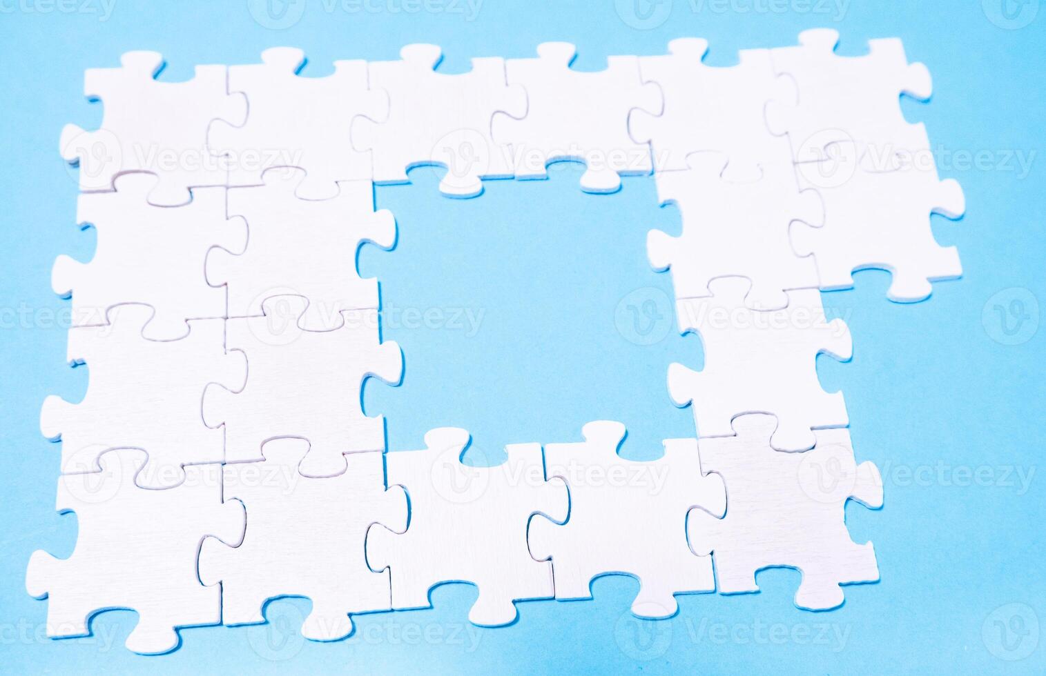 Puzzle with a white piece missing photo