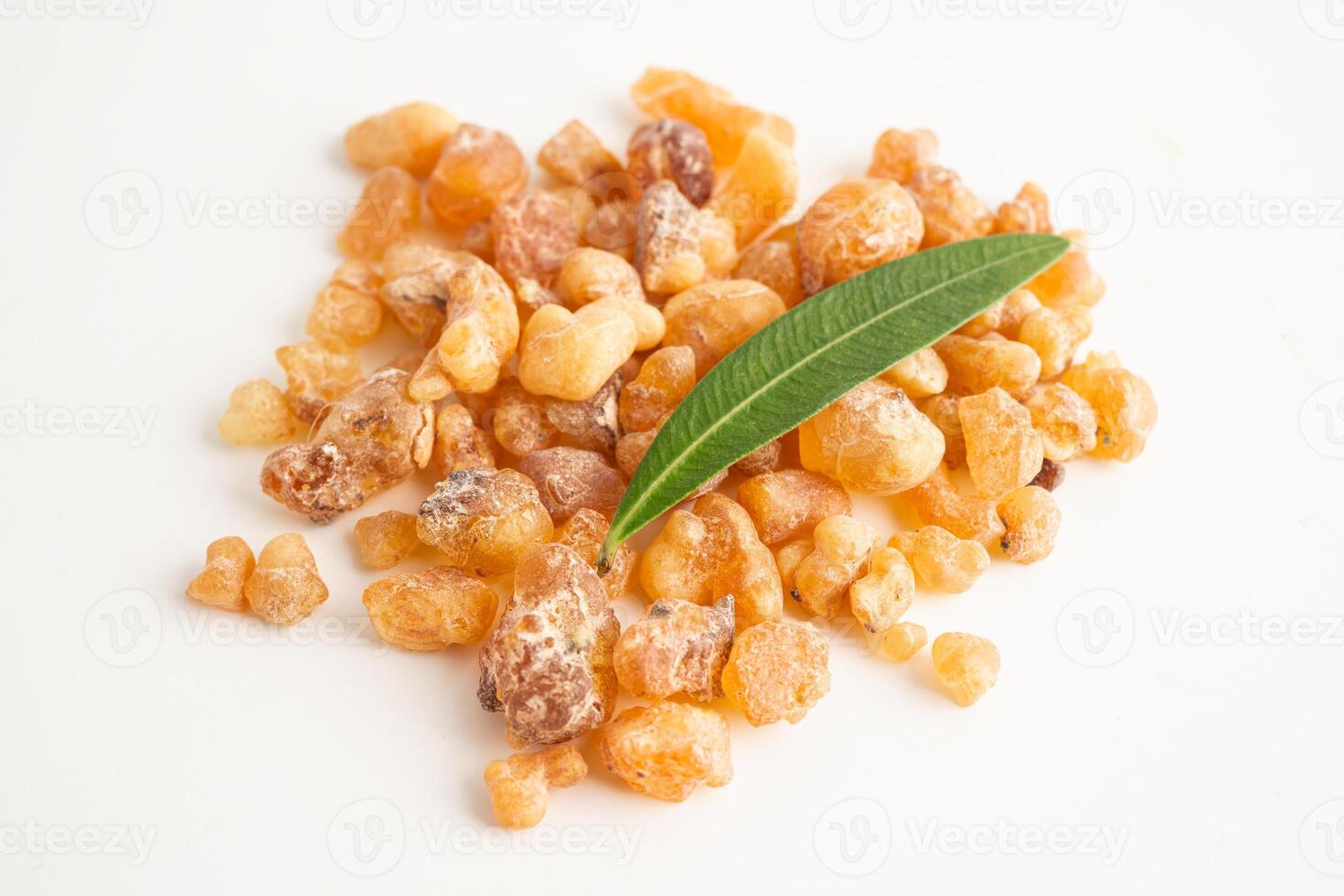 Frankincense or olibanum aromatic resin isolated on white background used in incense and perfumes. photo
