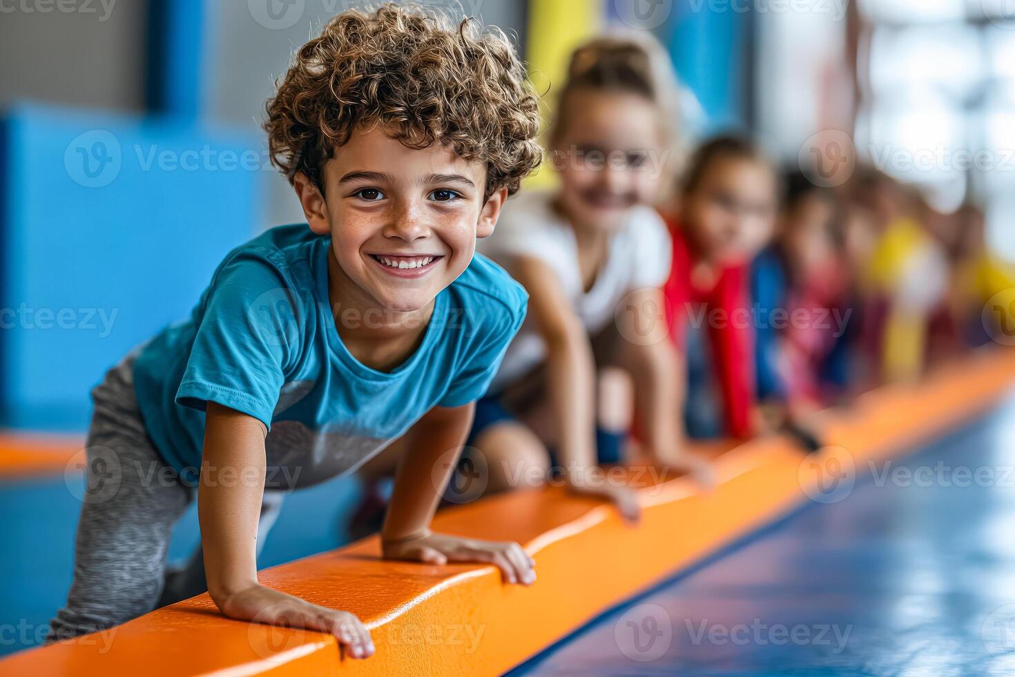 Group of children are lined up on a mat photo