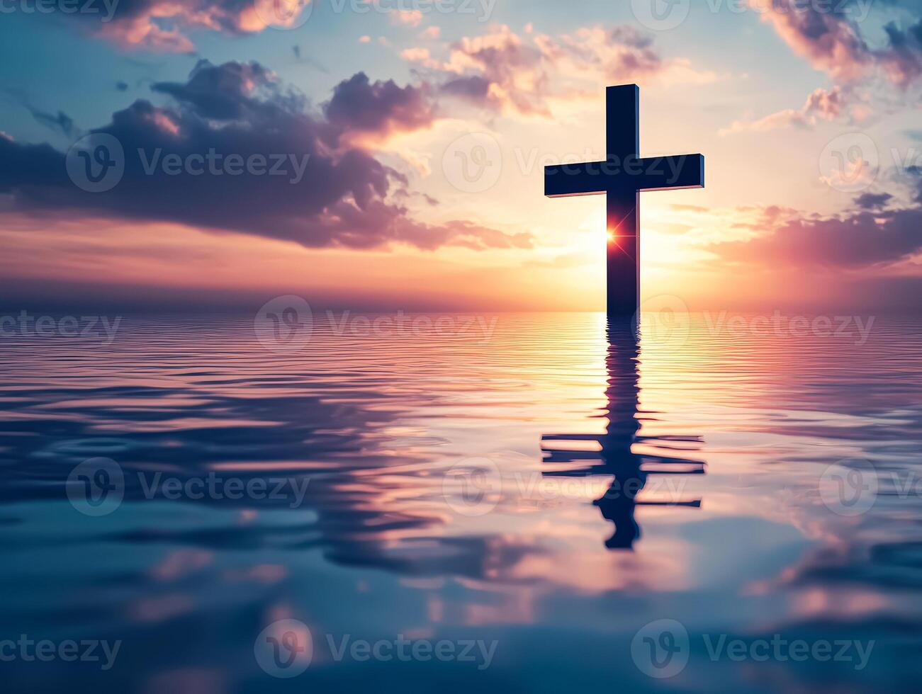 Large cross is floating in the ocean at sunset photo