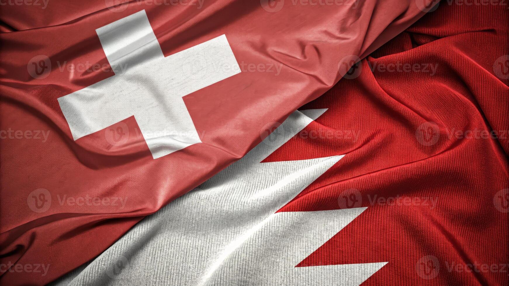 Close-Up of Swiss and Bahraini Flags Displaying National Unity and Harmony photo