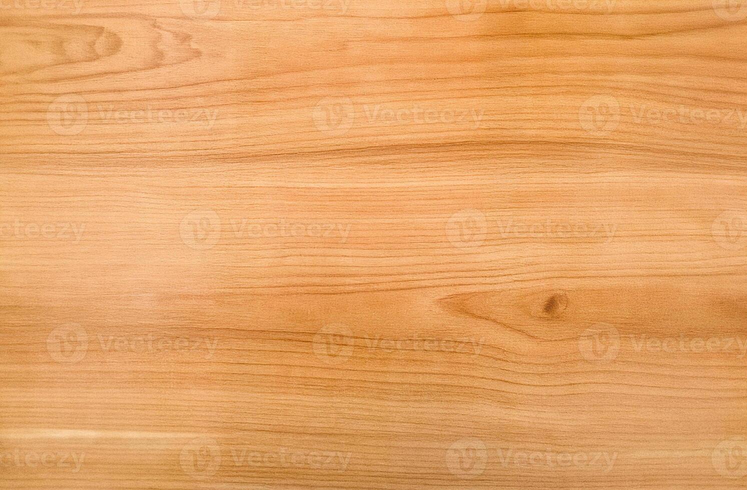 Light brown wooden surface with smooth texture and subtle grain lines photo