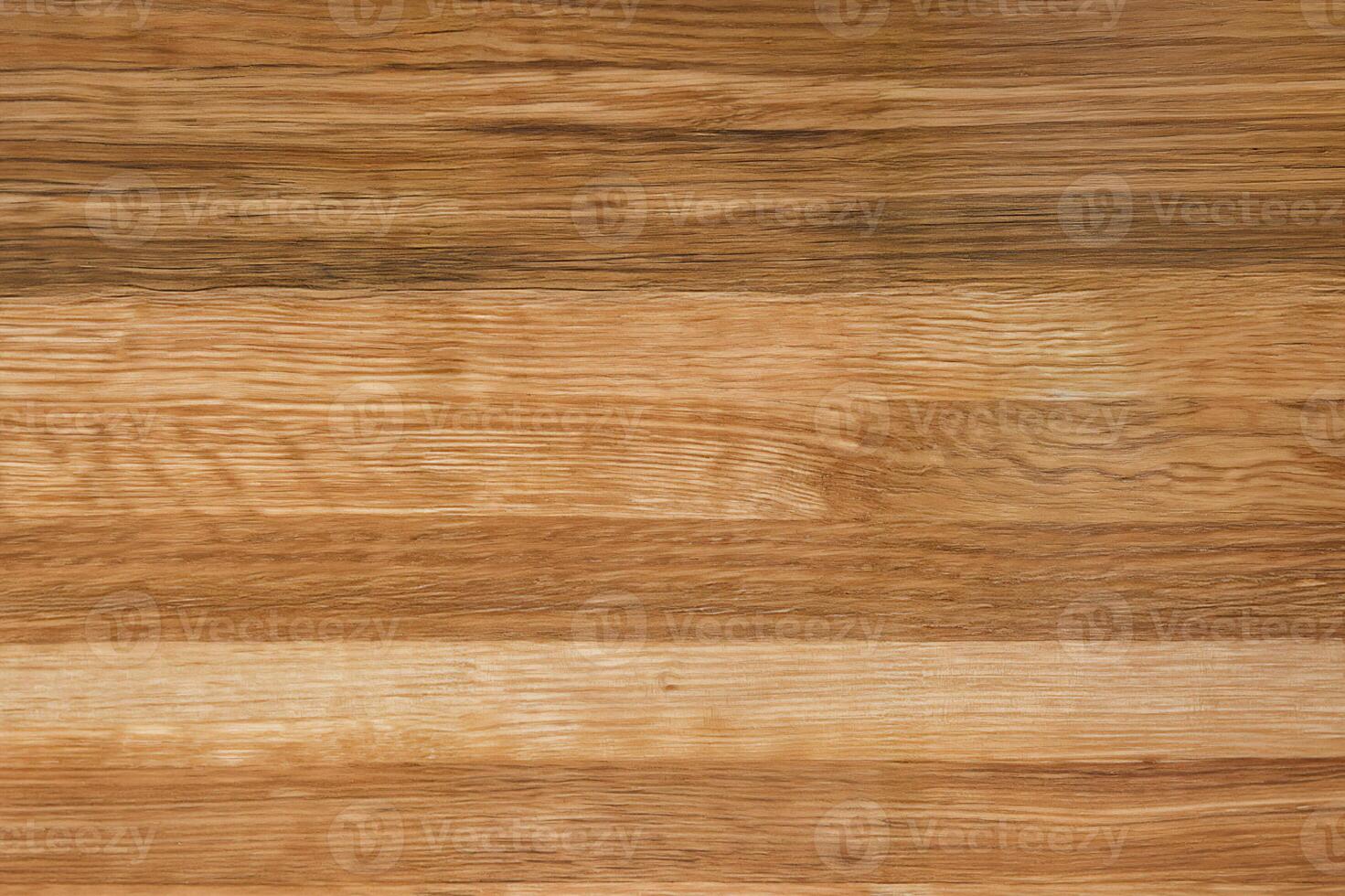 Polished natural wood texture with warm tones and linear grain pattern photo